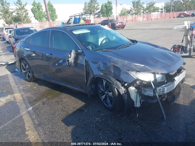 Honda Civic Touring 2017 2HGFC1F95HH642249 Image 1