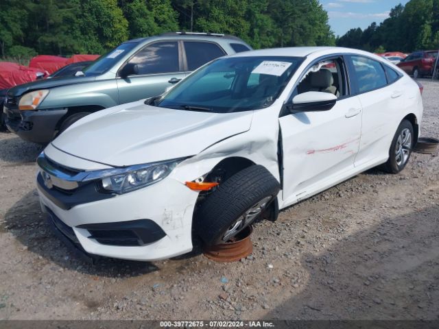 2HGFC2F52JH566563 Honda Civic Lx