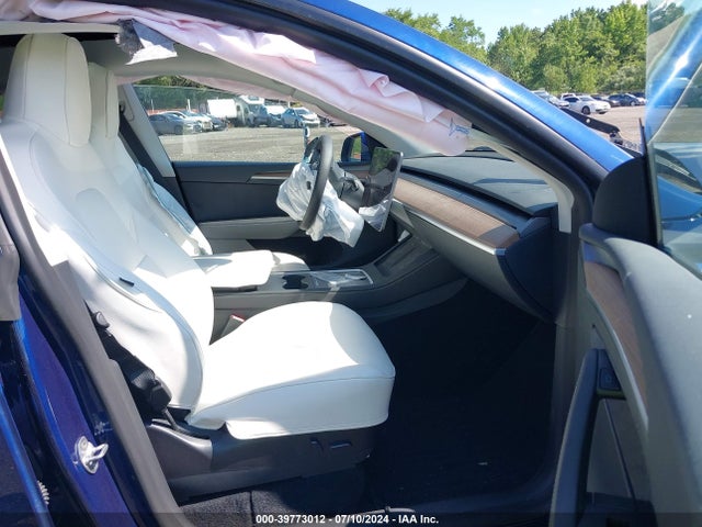 2023 TESLA MODEL Y 7SAYGDEEXPF703419 Photo 4
