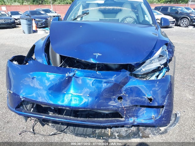 2023 TESLA MODEL Y 7SAYGDEEXPF703419 Photo 5
