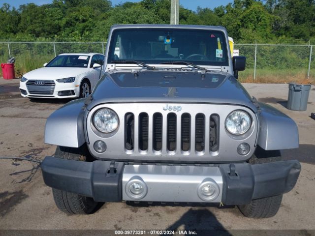 1C4BJWEG7EL271948 Jeep Wrangler Unlimited Sahara