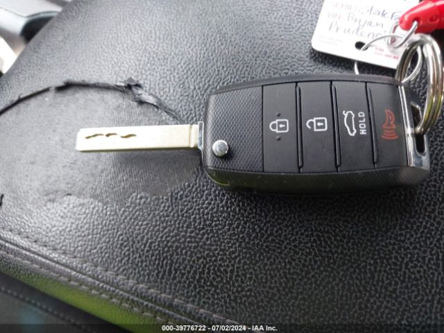 5XXGT4L34GG002975 KIA Optima Lx