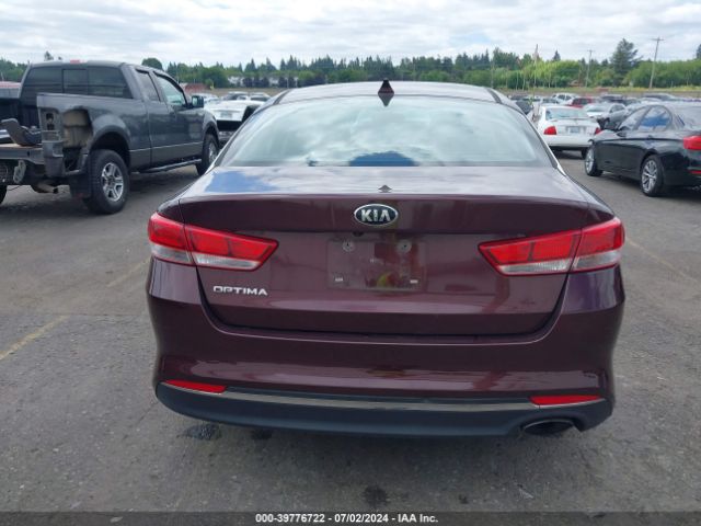 5XXGT4L34GG002975 KIA Optima Lx