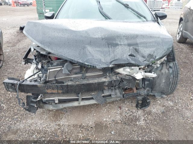 4T1BD1FK9EU133024 Toyota Camry Hybrid Le