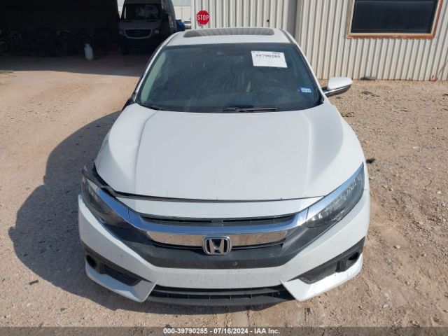 JHMFC1F94JX040120 Honda Civic Touring