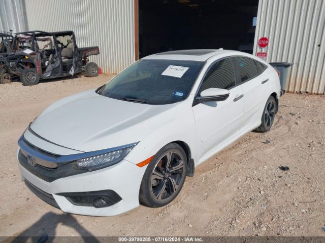 JHMFC1F94JX040120 Honda Civic Touring