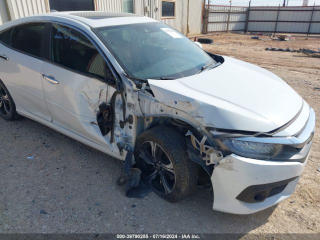 JHMFC1F94JX040120 Honda Civic Touring