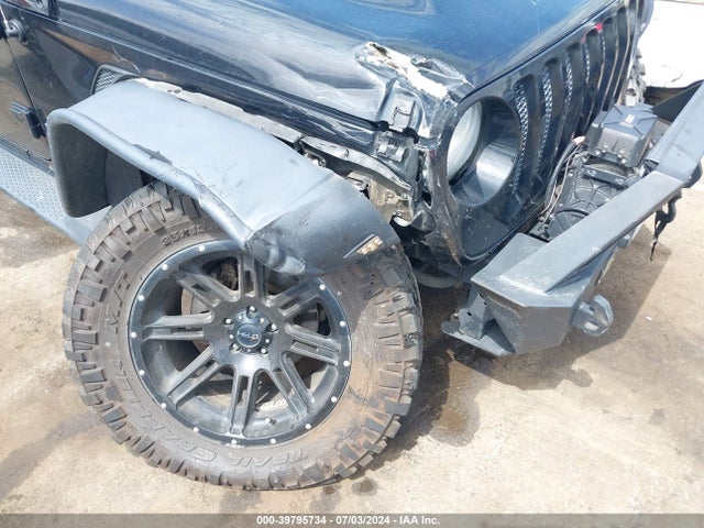 1C4GJXANXJW180990 Jeep Wrangler Sport S 4x4