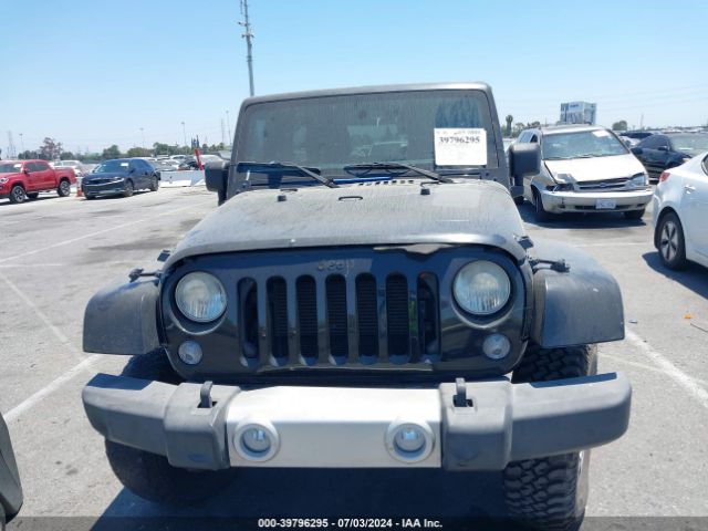 1C4BJWEG7EL128420 Jeep Wrangler Unlimited Sahara