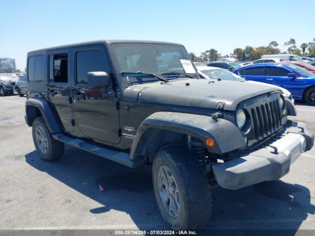 1C4BJWEG7EL128420 Jeep Wrangler Unlimited Sahara