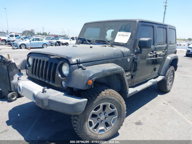 1C4BJWEG7EL128420 Jeep Wrangler Unlimited Sahara