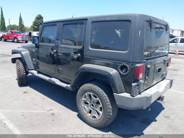 1C4BJWEG7EL128420 Jeep Wrangler Unlimited Sahara