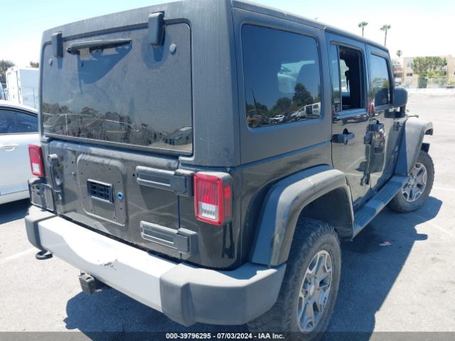 1C4BJWEG7EL128420 Jeep Wrangler Unlimited Sahara