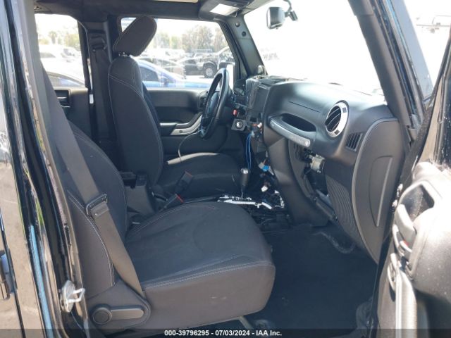 1C4BJWEG7EL128420 Jeep Wrangler Unlimited Sahara
