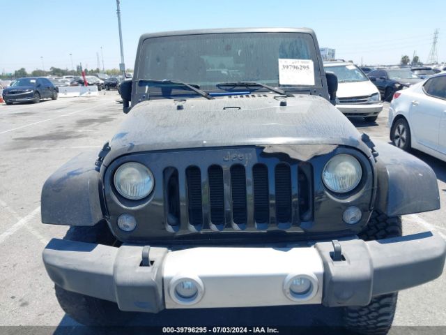 1C4BJWEG7EL128420 Jeep Wrangler Unlimited Sahara