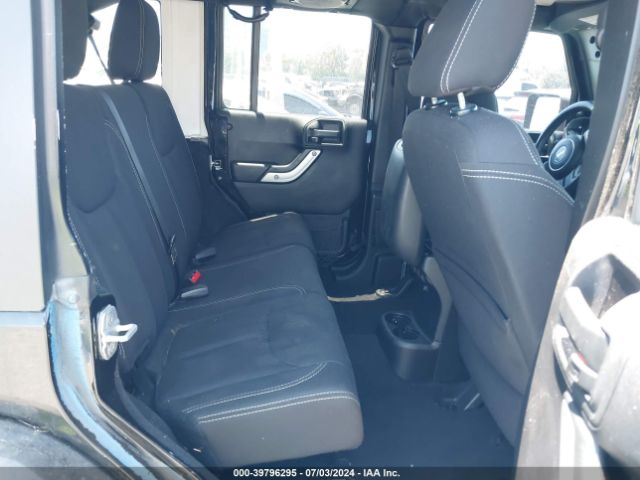 1C4BJWEG7EL128420 Jeep Wrangler Unlimited Sahara