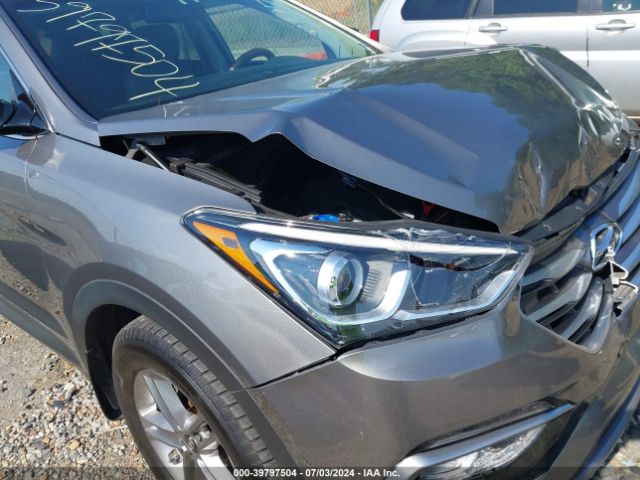5NMZU3LB5HH013297 Hyundai Santa Fe Sport 2.4l
