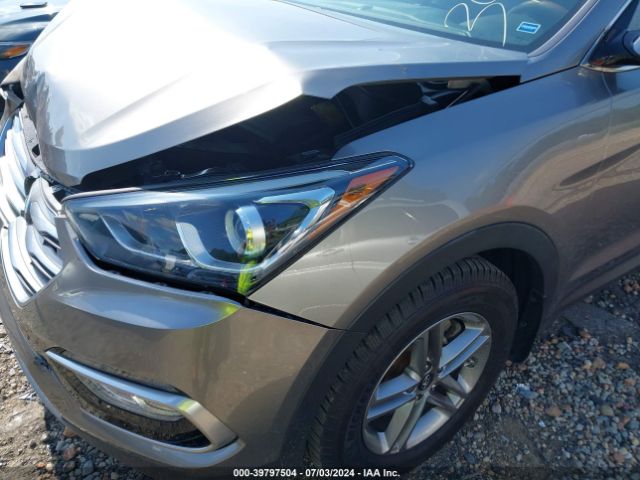 5NMZU3LB5HH013297 Hyundai Santa Fe Sport 2.4l