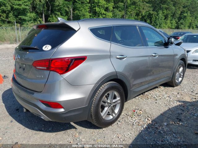 5NMZU3LB5HH013297 Hyundai Santa Fe Sport 2.4l