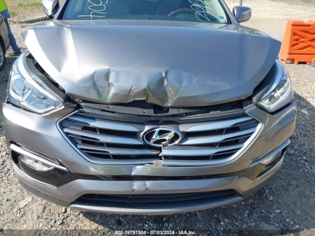 5NMZU3LB5HH013297 Hyundai Santa Fe Sport 2.4l