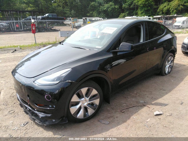 2024 TESLA MODEL Y 7SAYGDEE1RA227142 Photo 1