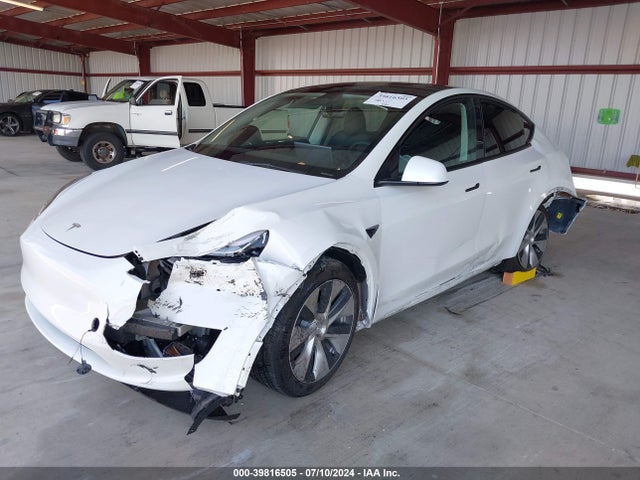 2023 TESLA MODEL Y 7SAYGDEE1PF738088 Photo 1