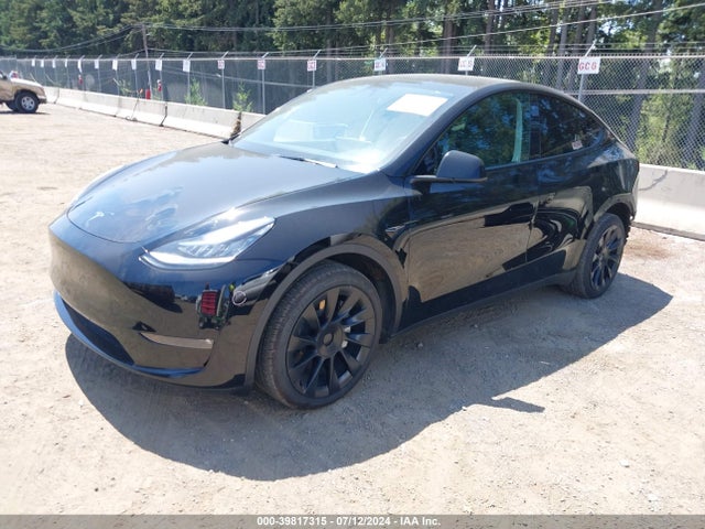 2023 TESLA MODEL Y 7SAYGDEE3PF590171 Photo 1