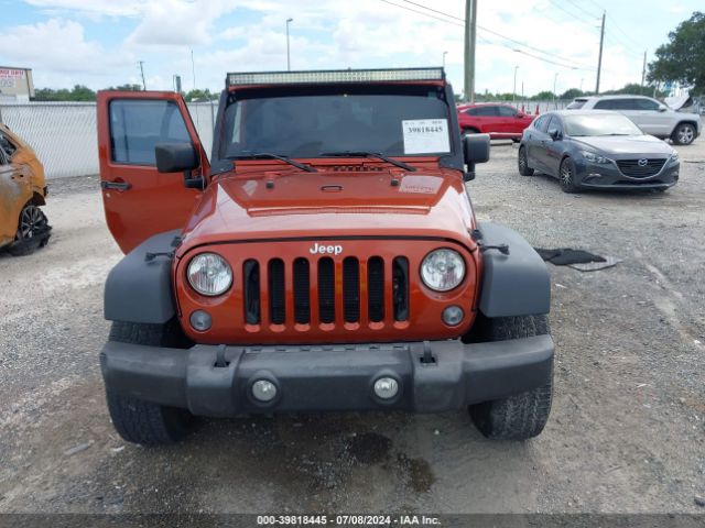 1C4BJWDG4EL259581 Jeep Wrangler Unlimited Sport