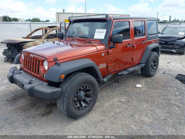 1C4BJWDG4EL259581 Jeep Wrangler Unlimited Sport