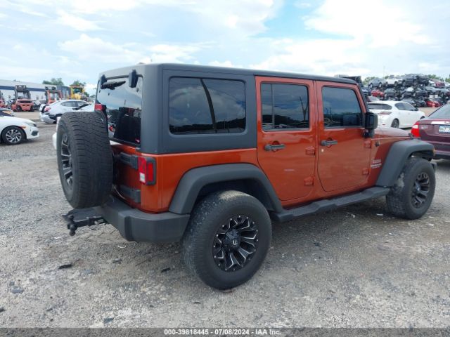 1C4BJWDG4EL259581 Jeep Wrangler Unlimited Sport