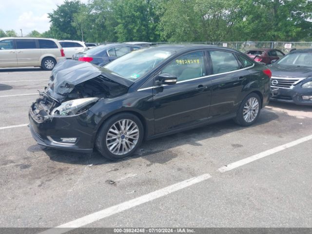 2015 FORD FOCUS 1FADP3J20FL297590 Photo 1