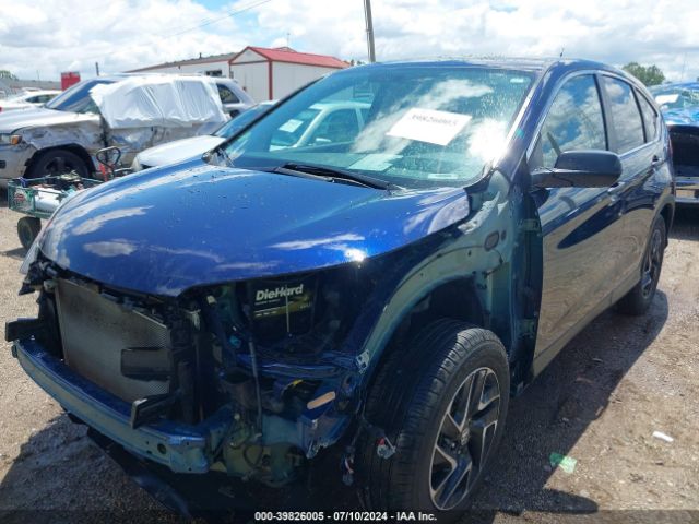 2HKRM4H42GH698666 Honda CR-V SE