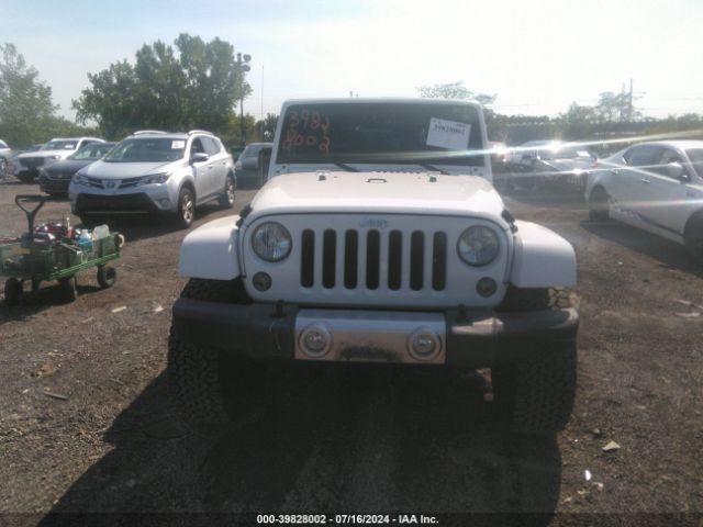 1C4AJWBGXFL742833 Jeep Wrangler Sahara