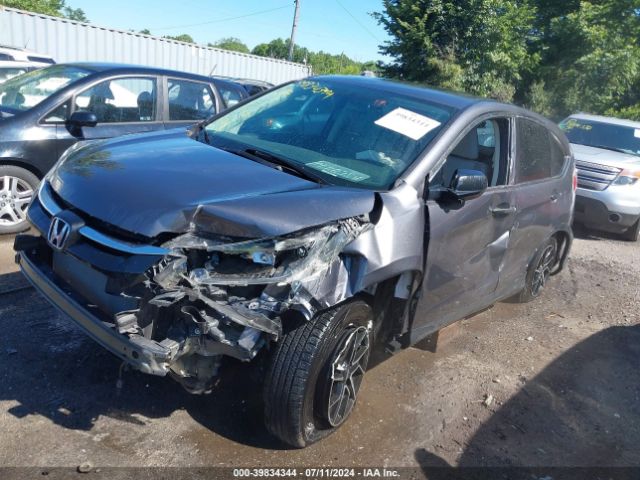 2HKRM4H38GH686609 Honda CR-V LX