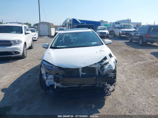 2T1BURHE5JC000052 Toyota Corolla Xle
