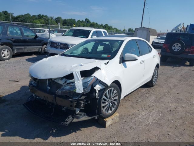 2T1BURHE5JC000052 Toyota Corolla Xle