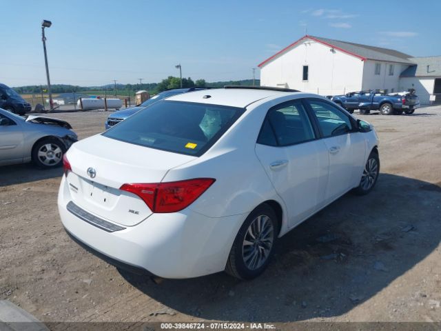2T1BURHE5JC000052 Toyota Corolla Xle