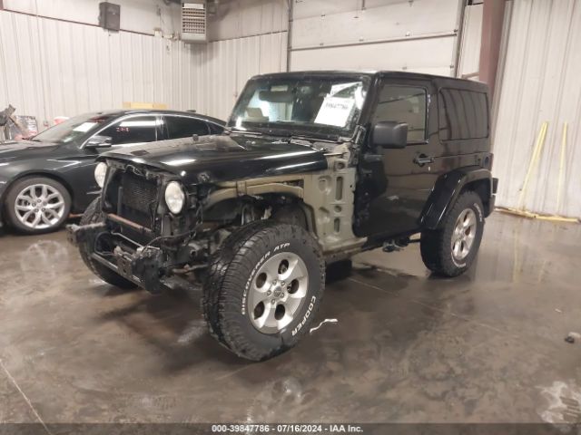 1C4AJWBG0EL150226 Jeep Wrangler Sahara