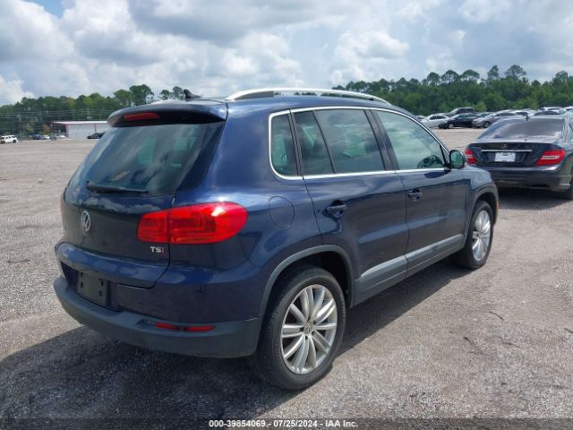 WVGAV7AXXGW597459 Volkswagen TIGUAN SE