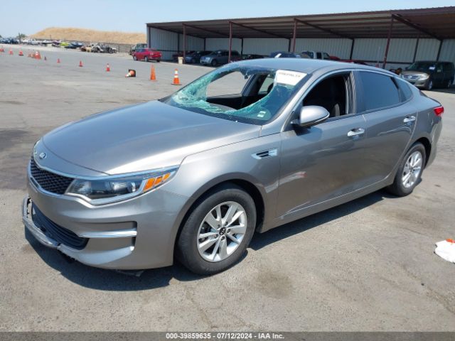 5XXGT4L36GG010611 KIA Optima Lx