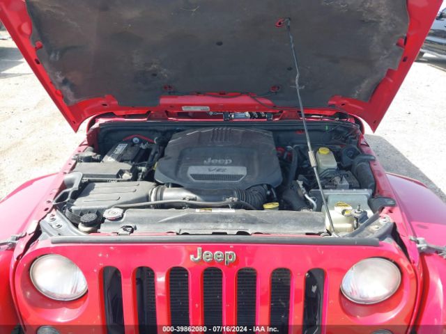 1C4BJWEG8EL186312 Jeep Wrangler Unlimited Sahara