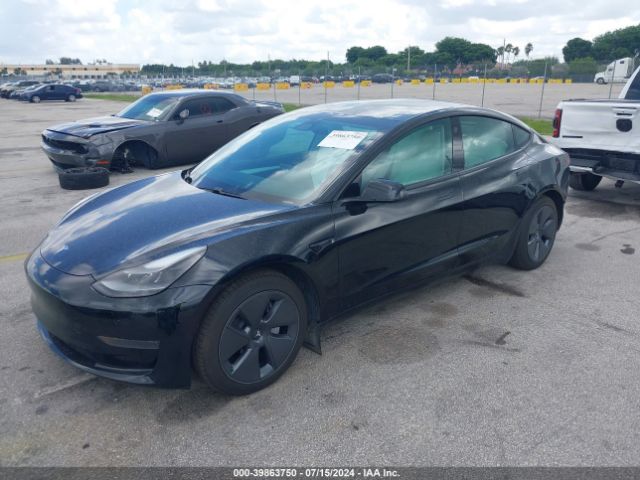 5YJ3E1EA3MF048816 Tesla Model 3 Standard Range Plus Rear-wheel Drive
