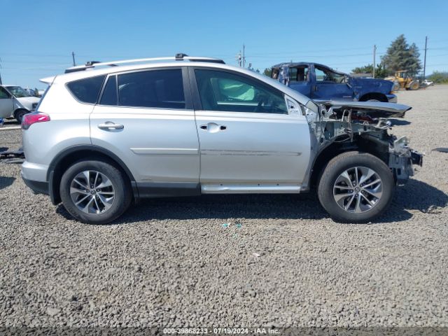 JTMRJREV6GD041412 Toyota Rav4 Hybrid Xle