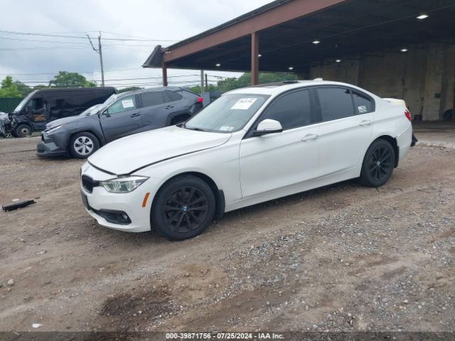 WBA8E5G57JNV02718 BMW 320i Xdrive
