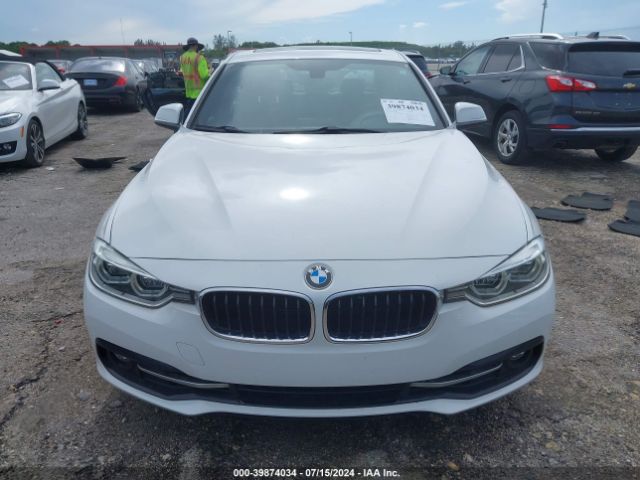 WBA8B9C59JEE82321 BMW 330I