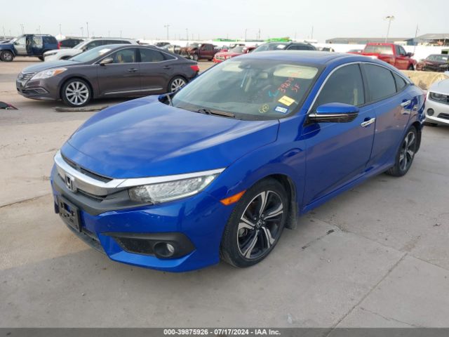 JHMFC1F93JX034602 Honda Civic Touring
