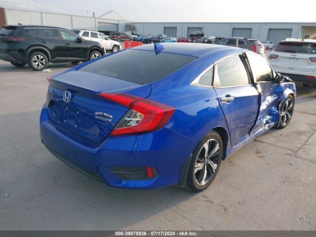 JHMFC1F93JX034602 Honda Civic Touring