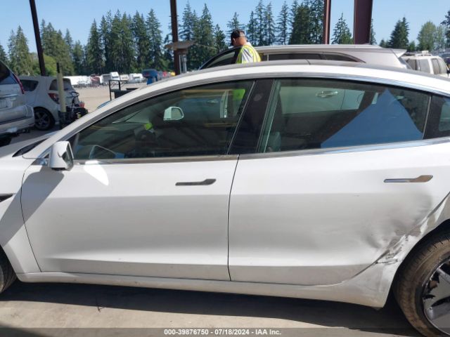 5YJ3E1EA9LF613004 Tesla Model 3 Standard Range Plus Rear-wheel Drive/standard Range Rear-wheel Drive
