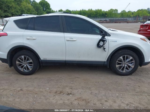 JTMRJREV8JD204083 Toyota Rav4 Hybrid Xle