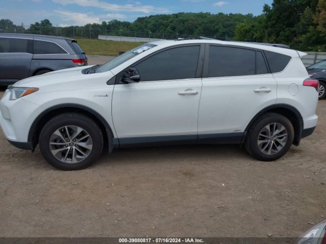 JTMRJREV8JD204083 Toyota Rav4 Hybrid Xle